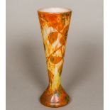 A Daum cameo glass vase Of cylindrical tapering form with trailing leaf decoration,