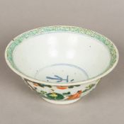 A Chinese famille verte porcelain bowl Decorated in the round with scholarly figures,