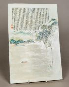 A Chinese porcelain plaque Decorated with a boatman in a river landscape and extensive calligraphic