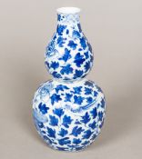 A Chinese blue and white porcelain vase Of double gourd form,