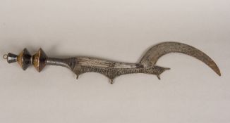 A 19th century Congolese Ngombe Tribe Ngala sword The blade of typical sickle form. 72 cm long.