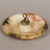 An early Islamic alabaster hanging oil lamp Of shallow circular form with a brass and steel