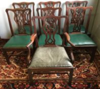 A set of six 19th century mahogany dining chairs Each with scrolling top rail above the pierced