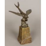 An early 20th century patinated bronze m