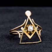 An unmarked gold diamond set ring