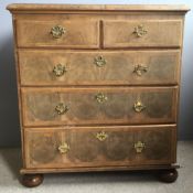 An 18th century walnut chest of drawers The moulded crossbanded top above an arrangement of two