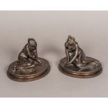 A pair of 19th century patinated bronze