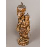 A large African tribal carved wooden fig