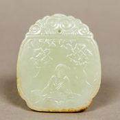 An 18th century carved celadon and russe