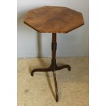 An early 19th century mahogany and oak tripod wine table The line inlaid crossbanded octagonal top