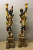 A pair of painted carved wooden Blackamo