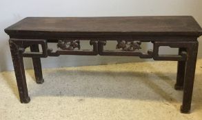 A 19th century Chinese hardwood low tabl