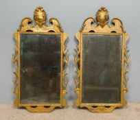 A pair of 18th century gilt framed wall