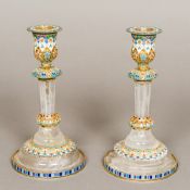 A pair of enamel decorated silver and ro