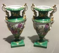 A pair of white and green Sevres style vase