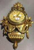 A gilt Cartel clock