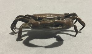 A bronze model of a crab