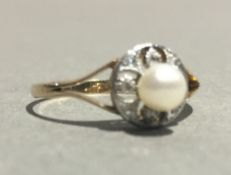 An 18 ct gold Edwardian diamond and pearl ring