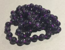 A string of amethyst beads