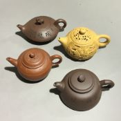 Four Yixing teapots