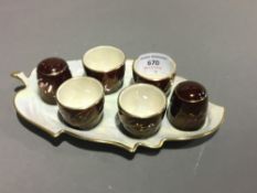 A Carlton Ware Rouge Royale egg cup cruet stand