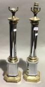 A pair of chrome lamps