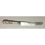 An 18th century unmarked white metal handled knife