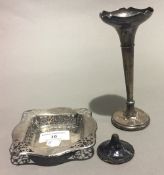 A silver dish and a silver bud vase