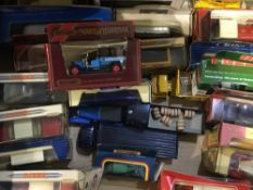 A collection of die-cast model vehicles,