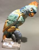 A porcelain figure of a parrot,