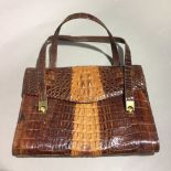 A crocodile skin handbag