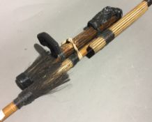 A carved blow pipe