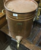 A copper tea urn