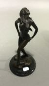 An erotic bronze female nude