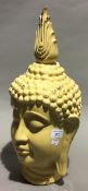 A yellow ground bust of Buddha