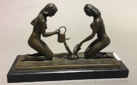 A bronze erotic group of gardeners