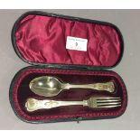 A cased silver spoon and fork