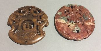 Two Chinese carved hardstone roundels