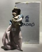 A large Lladro matt figural group,