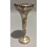 A silver bud vase