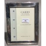 A boxed Carrs silver photograph frame (unused)