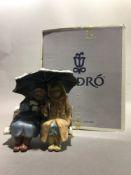 A boxed Lladro matt figural group,