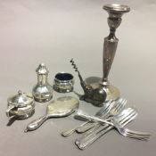 A small quantity of silver items, including a candlestick,