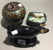Two Russian decorated papier mache boxes together with a Jackfield glaze cow creamer