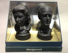 A pair of Wedgwood black basalt limited edition Royal silver wedding busts of HM Queen Elizabeth II