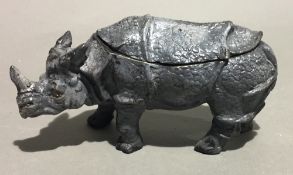 A cold painted bronze rhino form inkwell