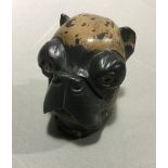A cold painted bronze inkwell formed as a pug dog