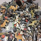 A collection of Britains and other lead soldiers, lead huntsmen, etc.