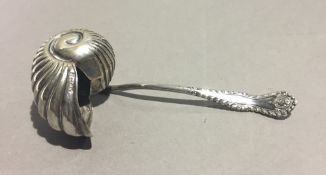 An usual silver plated sifter spoon,
