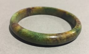 A Chinese jade bangle